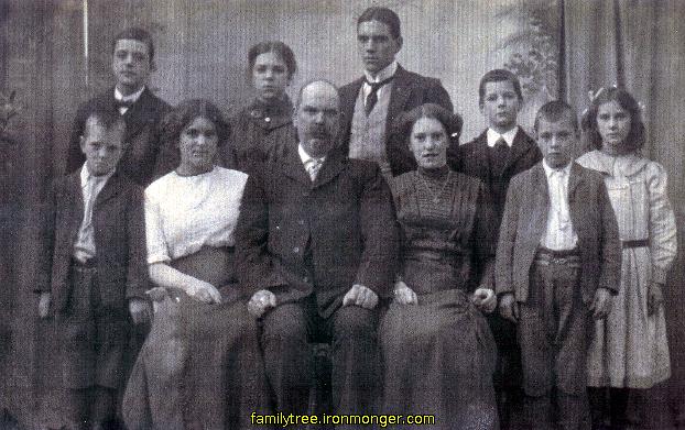 Charles Frederick Moore with Family About 1910
Back Row  (?), Hilda, Charles, Frank, Minnie.
Front Row (?), Fannie, Charles Frederick, Elizabeth,  (?)